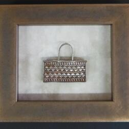 Woven copper and silver basket